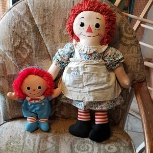 Raggedy Ann and raggedy Andy ⁸Dolls one Vintage